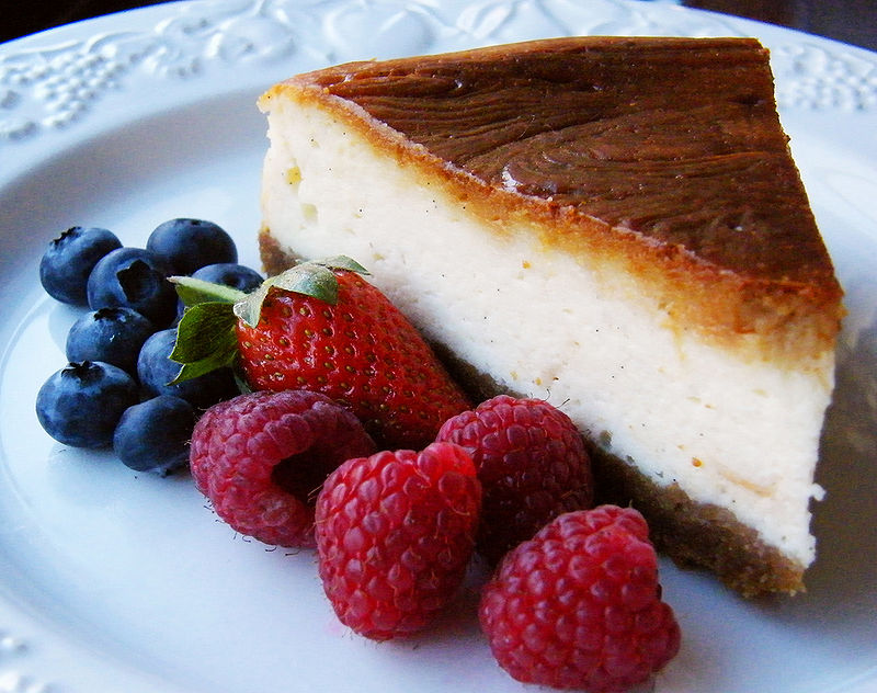 Baked cheesecake with raspberries and blueberrie. Photo Credit