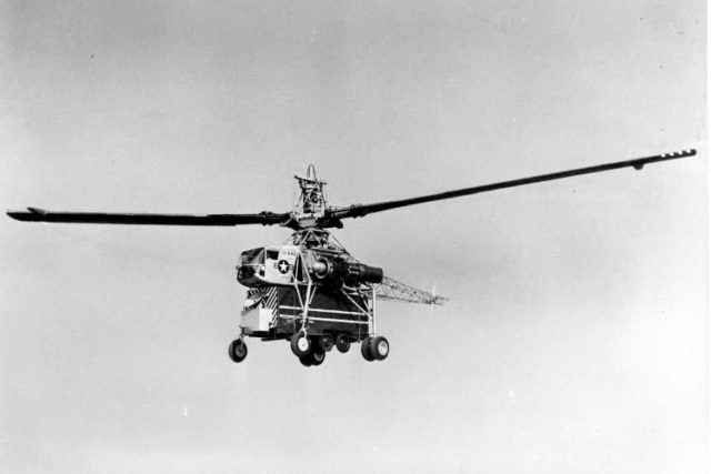 Entry to the cockpit required a pair of tall ladders attached to the forward landing gear legs. Photo Credit