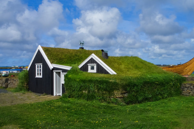 A house with a turf roof and walls near Reykjavik, Iceland. Turf was plentiful in Iceland and provided superior insulation against the weather than wood or stone. Photo Credit