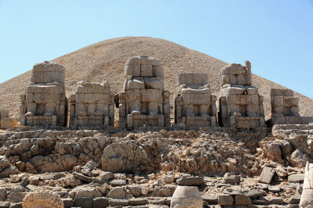 A mountain adorned with the fragments of vast statues built over 2000 years ago. Photo Credit