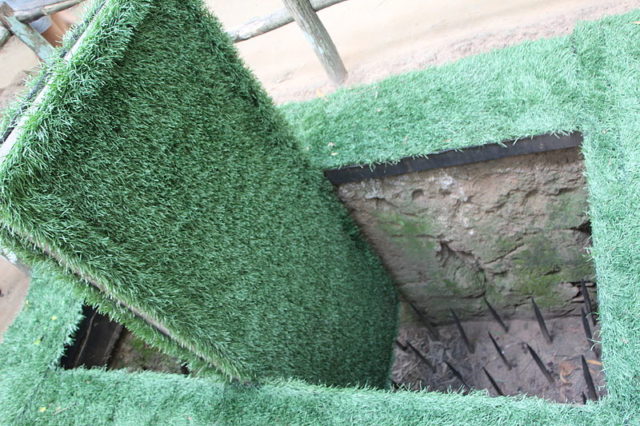 An example of a boobytrap at Cu Chi Tunnels. These traps were originally used for bears, but during the war they were used to trap other enemy soldiers. Photo Credit