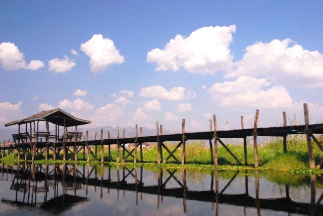 Construction began when the capital of Ava Kingdom moved to Amarapura, and the bridge is named after the mayor who had it built. Photo Credit