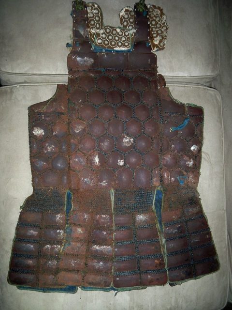 Edo period tetsu kikko tatami dō. A lightweight portable folding tatami cuirass, made from small metal hexagon armor plates (kikko), sewn to a cloth backing.Photo Credit