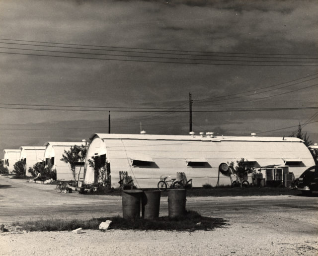 Generally the shape of the Quonset hut is half cylindrical. Photo Credit