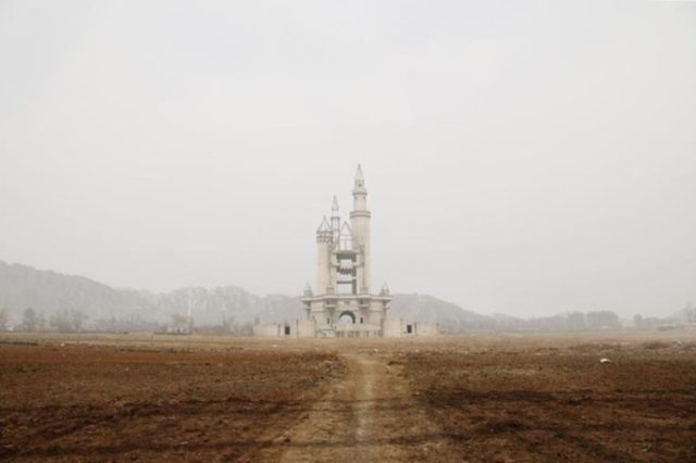 In the Changping District of China, some 20 miles outside of Beijing, the ruins of an abandoned castle once rose out of the desolate landscape. Photo Credit