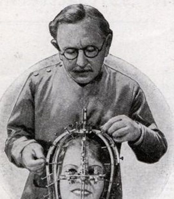 Max Factor in 1935, demonstrating his beauty micrometer device.