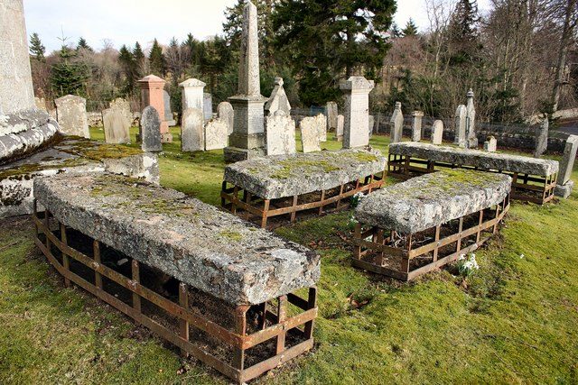 Mortsafes in Cluny kirkyard, Aberdeenshire, Scotland. Photo by Martyn Gorman / Mortsafes in Cluny kirkyard / CC BY-SA 2.0