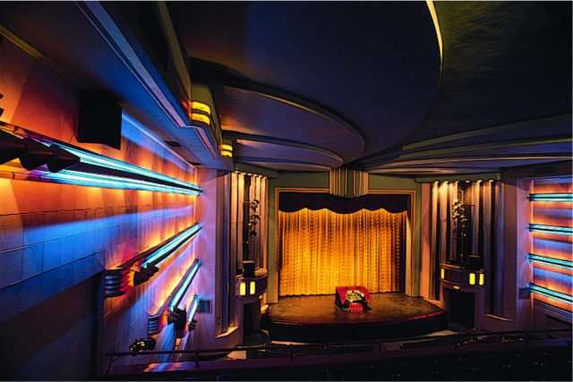 Originally designed in the Renaissance style, the theater was restored in the 80’s with a more art deco style interior. Photo Credit