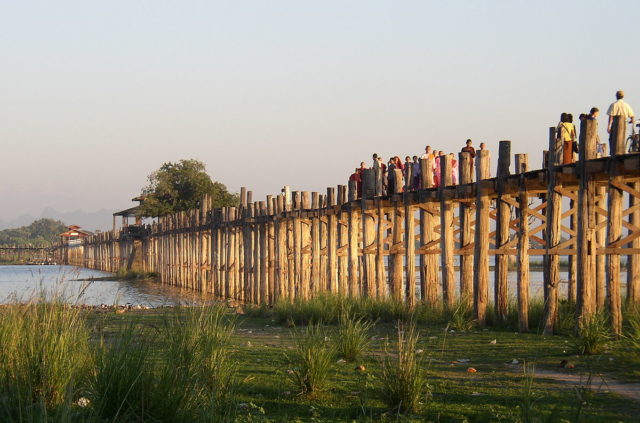 The bridge was actually built using teak wood reclaimed from the former Royal Palace. Photo Credit