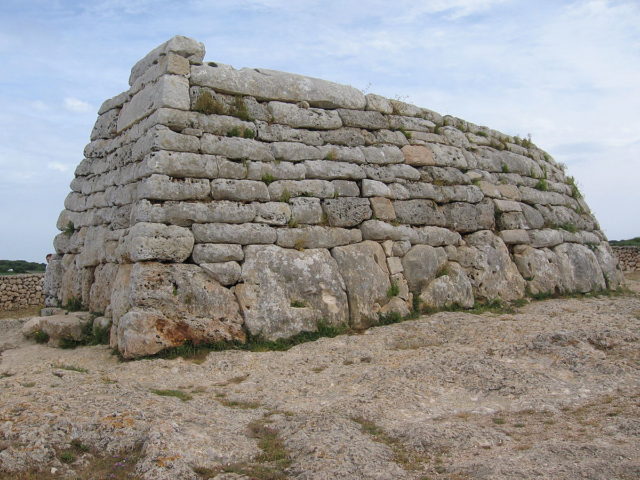 The façade is slightly convex. It is markedly sloped and so are the side walls and apse. Photo Credit