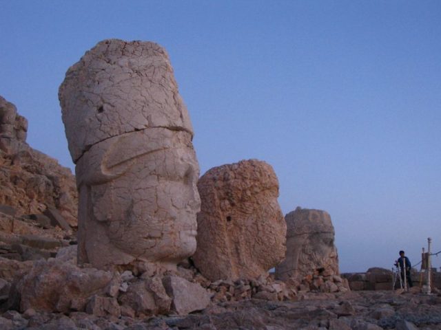 The statues appear to have Greek-style facial features, but Persian clothing and hairstyling. Photo Credit