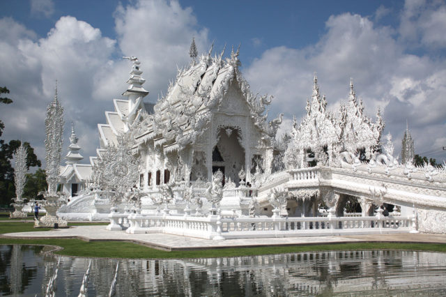 Whereas most of Thailand’s Buddhist temples have centuries of history, Wat Rong Khun’s construction began in 1997. Photo Credit