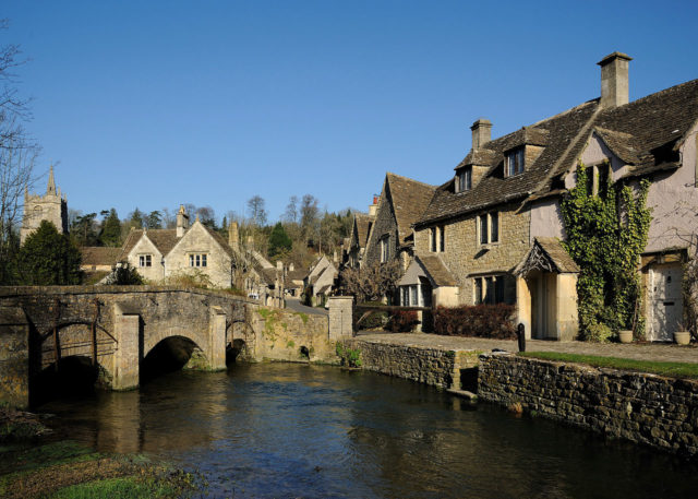 Castle Combe is a small Cotswold village in Wiltshire, England, with a population of about 350. .Photo Credit