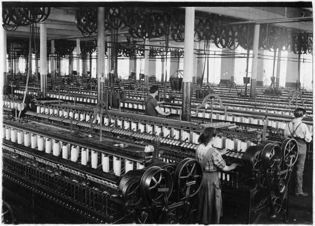Three spinners in spinning room, 1912 Photo Credit
