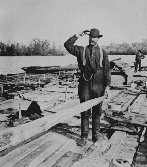 Rafts were assembled in sections. Each section was made up of round or squared timbers, all of the same length except for the outside, or “boom logs,” which extended aft a few feet to enclose the following section. Thus the sections were coupled together. A fairly typical raft would be one of three, four or five sections, each section having timbers twenty to thirty feet in length.
