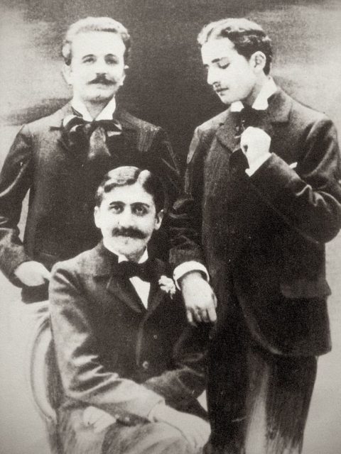 Marcel Proust (seated), Robert de Flers (left) and Lucien Daudet (right), ca. 1894.