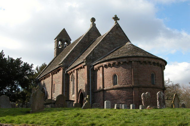 A simple Norman two-cell church with a rounded apse. Photo Credit