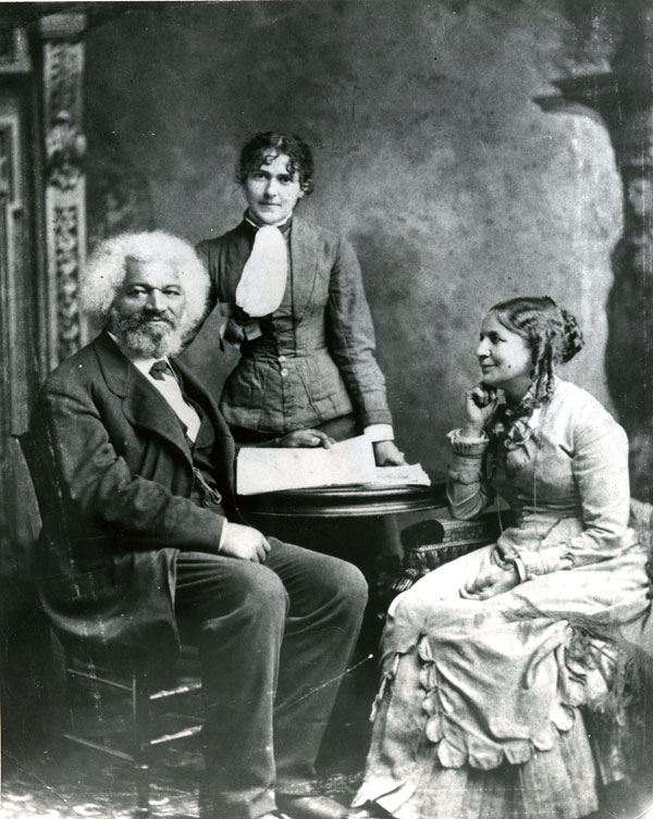 Frederick Douglass with his second wife Helen Pitts Douglass (sitting). The woman standing is her sister Eva Pitts.