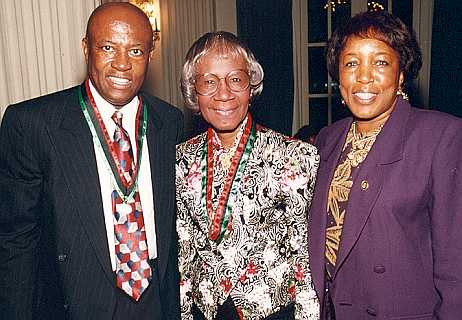 Shirley Chisholm (center) with Congressman Edolphus Towns (left) and his wife, Gwen Towns (right)