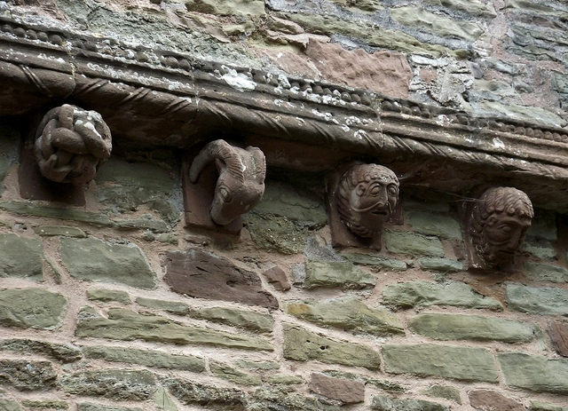 Four corbels. Photo Credit