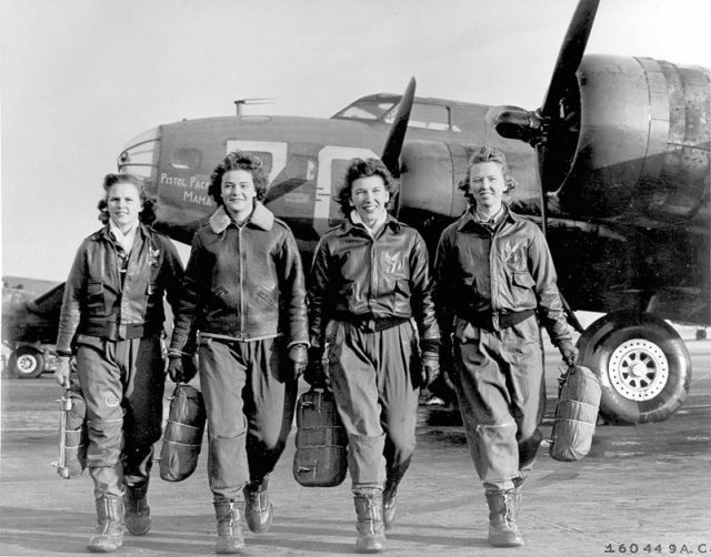 Frances Green, Margaret (Peg) Kirchner, Ann Waldner and Blanche Osborn leaving their plane, "Pistol Packin' Mama," at the four-engine school at Lockbourne AAF, Ohio, during WASP ferry training B-17 Flying Fortress