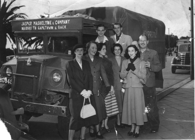 Jasper Maskelyne and his magic troupe departing from Nairobi in 1950. Jasper Maskelyne is on the right, touching the arm of Yvonne Helliwell, his stage assistant