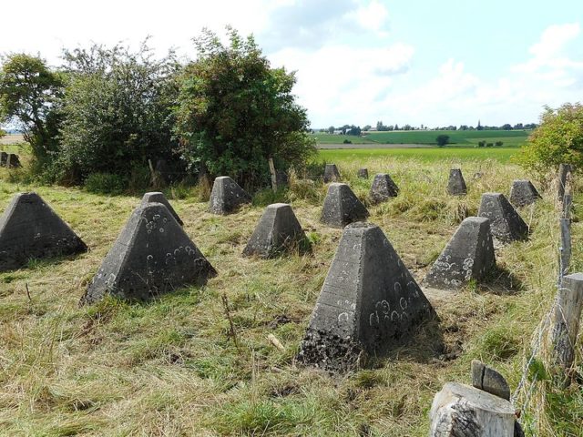 Large shaped blocks of concrete, strengthened with a steel core. Photo Credit