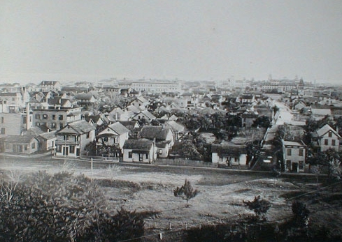 View of St. Augustine from the former San Marco Hotel, Spanish St. on left, Huguenot Cemetery lower left corner, Cordova St. on right