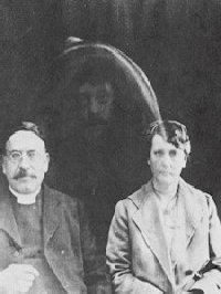 Reverend Charles L Tweedale, his wife, and the spirit of her deceased father 1919