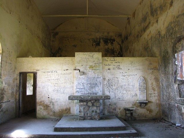 Inside of abandoned church, Bokor Hill Station, Cambodia Photo Credit