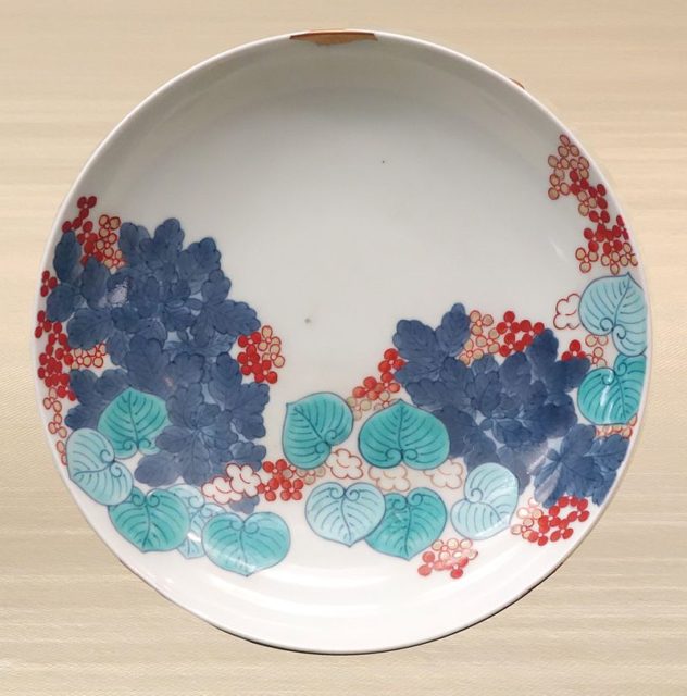 Small repair (top) Nabeshima ware dish with hollyhock design, overglaze enamel, 18th century, Edo period Photo Credit