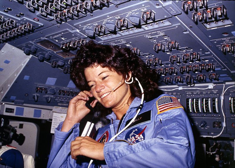 Sally Ride communicates with ground controllers from the flight deck during the six-day mission in Challenger, 1983