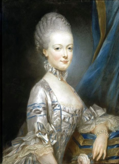 Marie Antoinette wearing the distinctive pouf style coiffure: her own natural hair is extended on the top with an artificial hairpiece