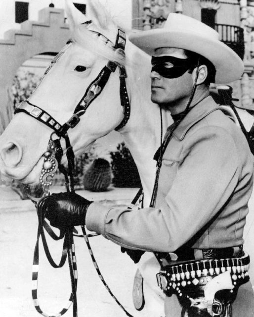 Publicity photo of Clayton Moore as the Lone Ranger and Silver from a personal appearance booking at Pleasure Island (Massachusetts amusement park), Wakefield Massachusetts. Photo Credit