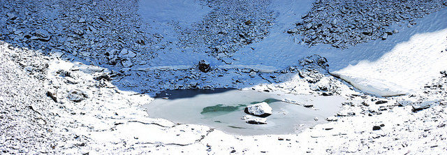 Roopkund lake is covered with ice for most of the year. Photo by Abhijeet Rane CC BY 2.0