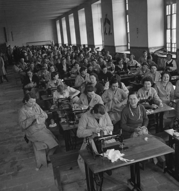 Polish-women-make-their-own-clothing-at-a-camp-in-Tehran Photo Credit