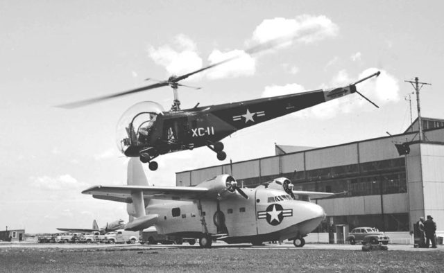 A Bell HTL-1 taking off over a Grumman Albatross prototype at Floyd Bennett Field (May 1948) Photo Credit 