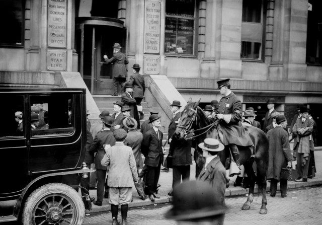 People wait for news outside the offices of the White Star Line in New York. Photo Credit