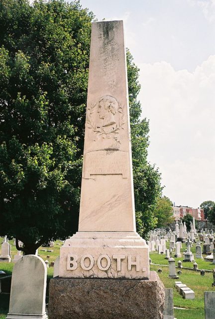 Booth Family grave-site, Green Mount Cemetery, where Booth is buried in an unmarked grave (2008). Visitors would often come and put pennies on the gravestone, as a symbolic protest for his actions Photo Credit