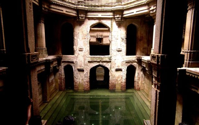 Ornate wall of the Adalaj stepwell. Photo Credit