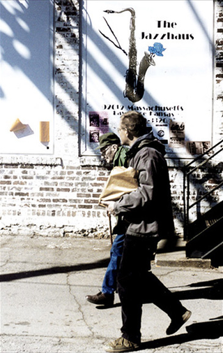 William S. Burroughs and James Grauerholz in the alley behind the Jazzhaus in Lawrence, Kansas (1996)