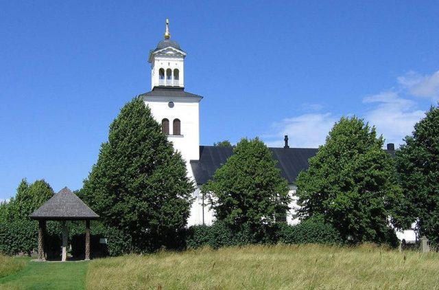 The stone is housed under a roof and is located near the church in which it was discovered Photo Credit