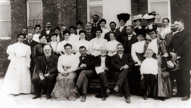 Carnegie with African-American leader Booker T. Washington (front row, center), seen here in 1906 while visiting Tuskegee Institute