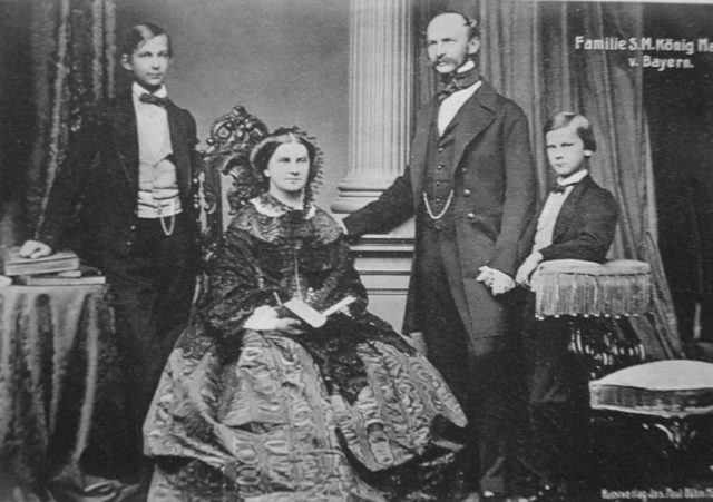 Crown Prince Ludwig of Bavaria (left) with his parents and younger brother Prince Otto in 1860