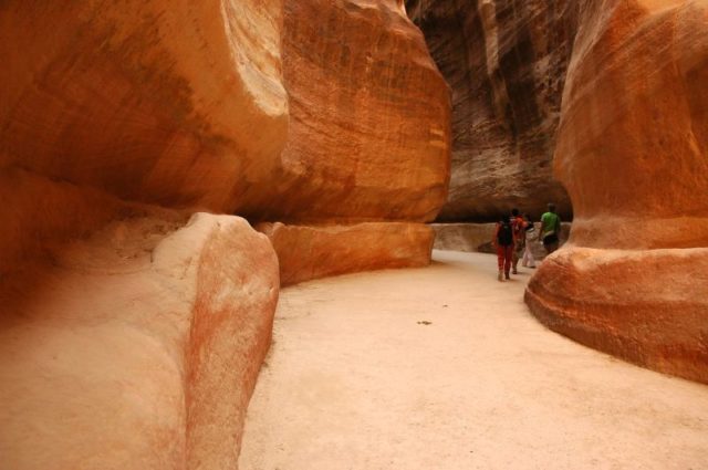 The narrow passage (Siq) that leads to Petra Photo Credit