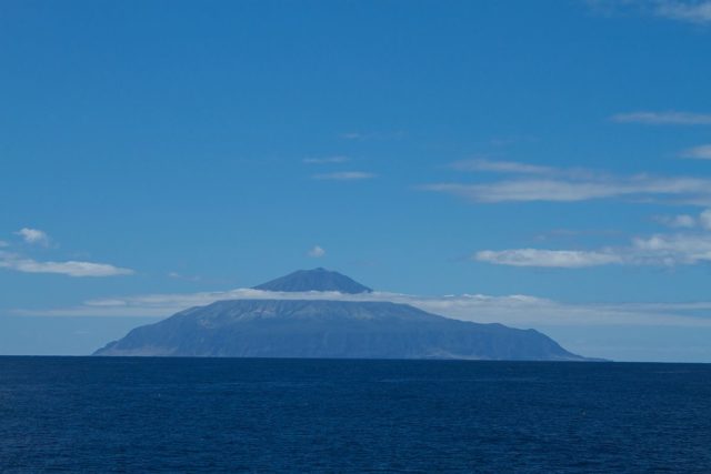 The majesty of the world’s most remote inhabited archipelago unravels in the ocean. Photo credit