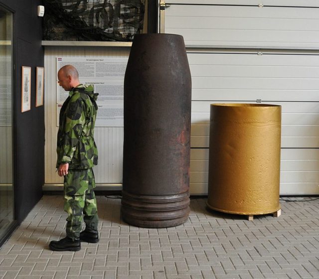 Pod shell Schwerer Gustav, next to a person for the purpose of perspectivePhoto Credit