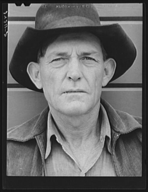 Migrant field worker. Tulare migrant camp. Visalia, California Photo Credit