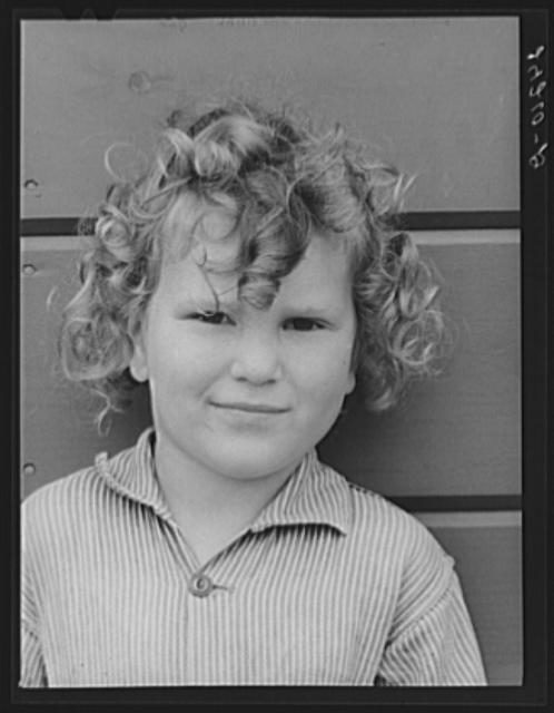 Migrant girl. Tulare migrant camp. Visalia, California Photo Credit