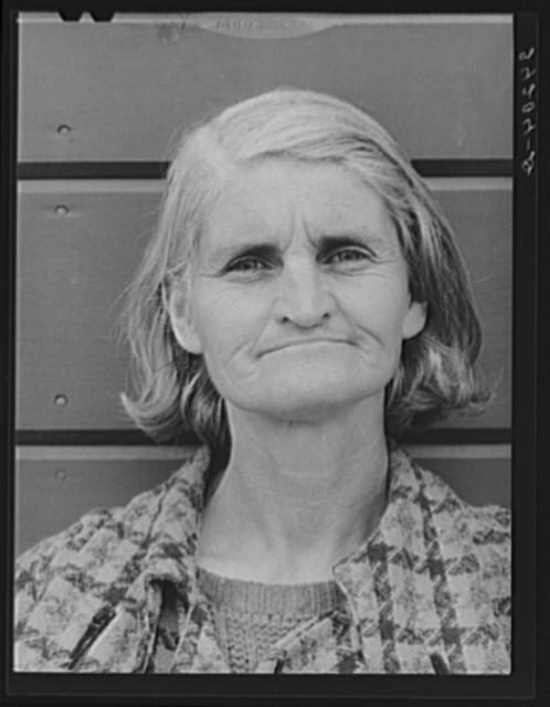 Wife of a migrant. Tulare migrant camp. Visalia, California Photo Credit